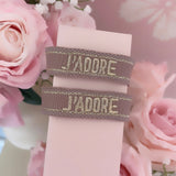 Bracelet « J’ADORE » taupe doré