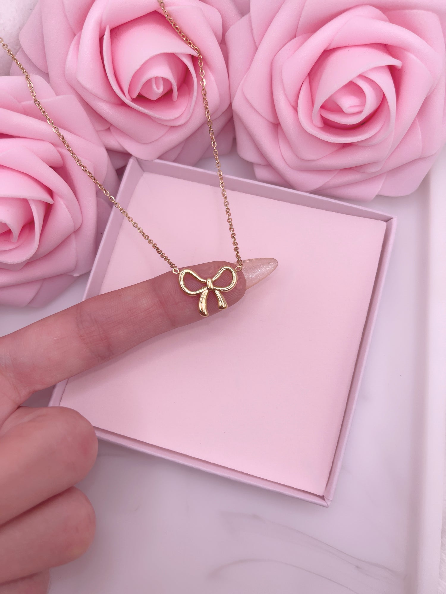 COLLIER BOWS