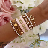 BRACELET BRODÉ GOSSIP GIRL ROSE DORÉ
