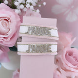 Bracelet « J’adore » blanc rose doré