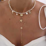 COLLIER PERLES BORD DE MER